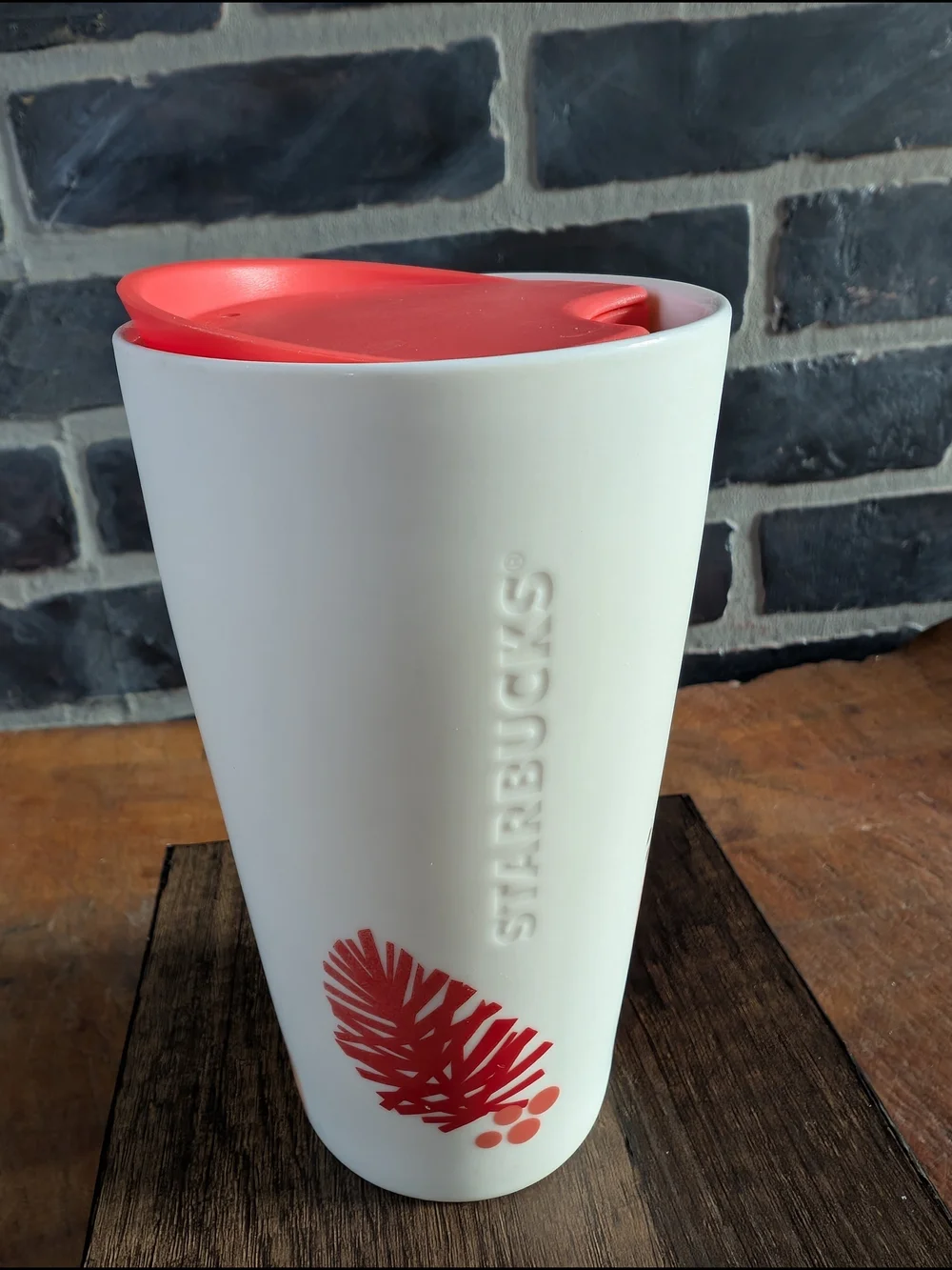 Starbucks White Ceramic Travel Mug with Coral Lid and Pinecone Accent